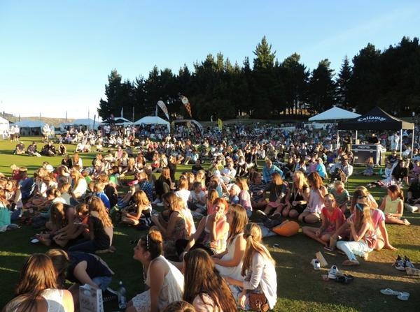 People enjoy the late afternoon sun earlier this year at The Hills.